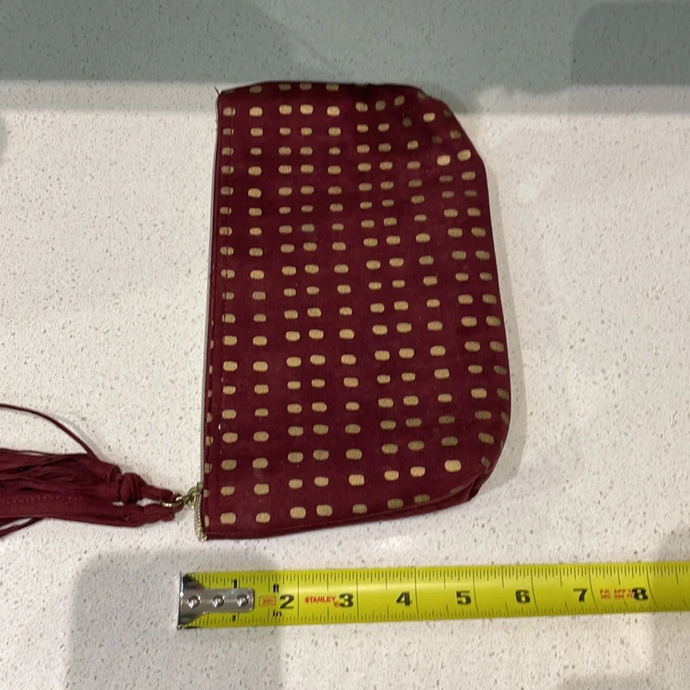 Kit & Luc maroon gold suede tassel zip cosmetics bag